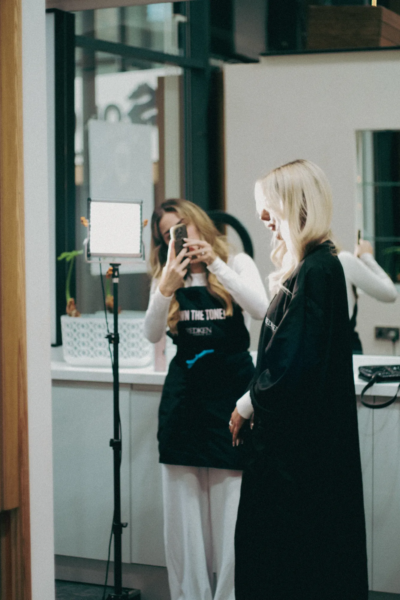 Jeanna styling a client's hair at Wigs & Warpaint, Sheffield