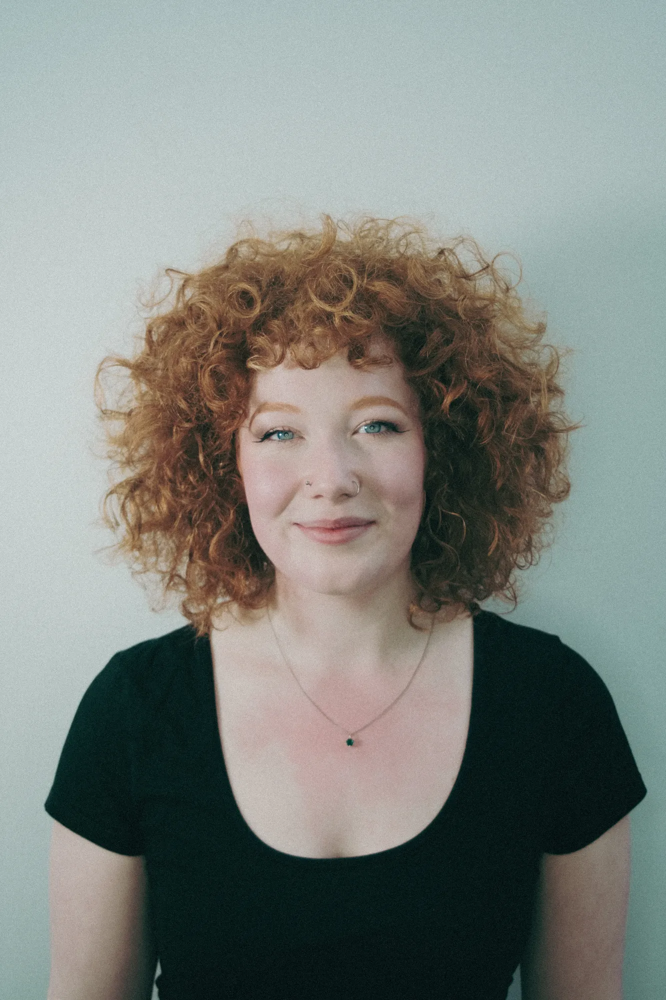 Short copper curls, front view, at Wigs & Warpaint, Sheffield