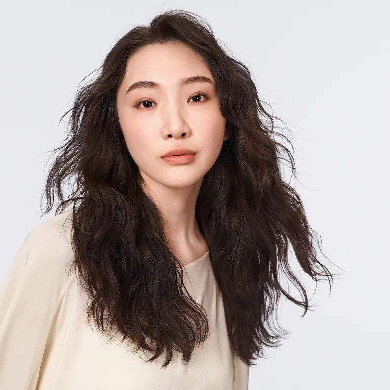 Soft brunette waves from the Goldwell Texture Dimensions campaign